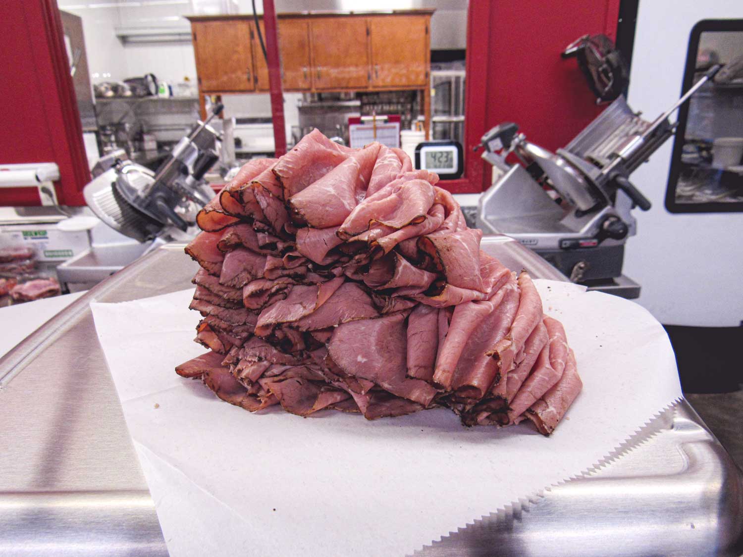 Pile of sliced roast beef on platter
